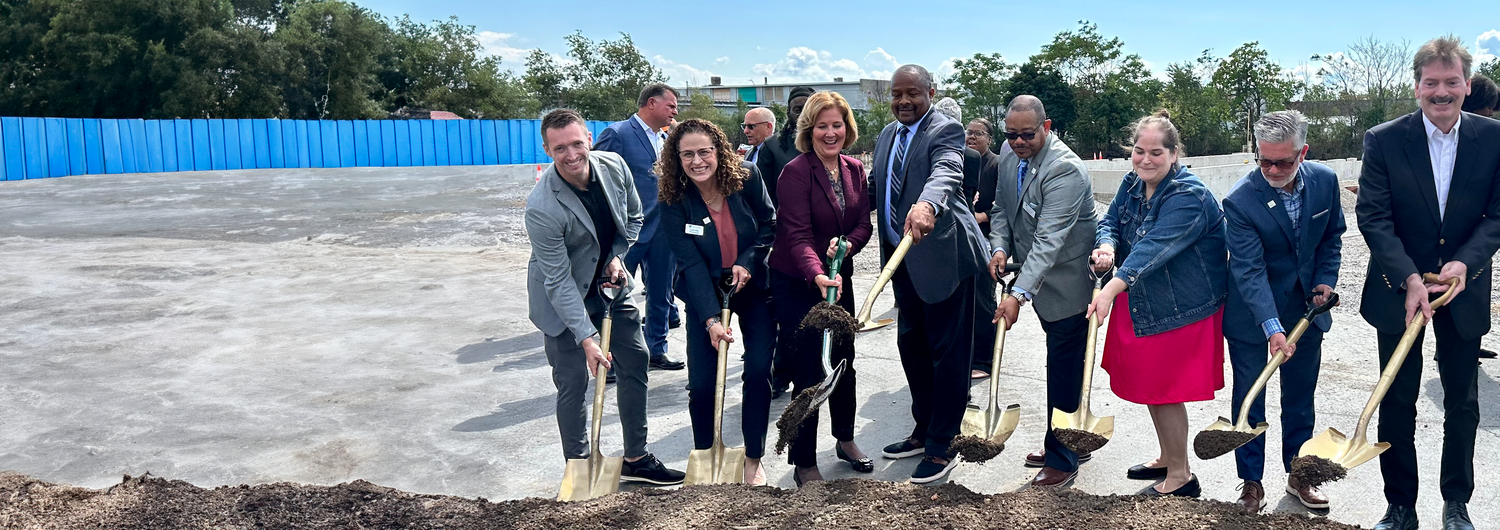 Upcoming events: Photo of People Inc. leadership and supporters taking part in a groundbreaking with gold painted shovels