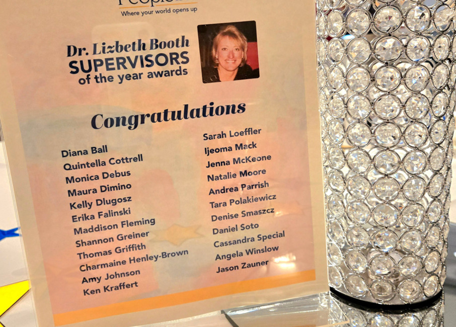 A congratulations sign featuring the names of the 2024 Dr. Lisbeth Booth Supervisors of the Year Award winners